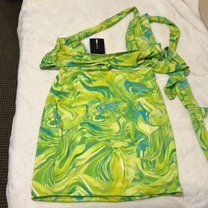 Fashion nova size medium matching set of 2. Skirt and wrap top.